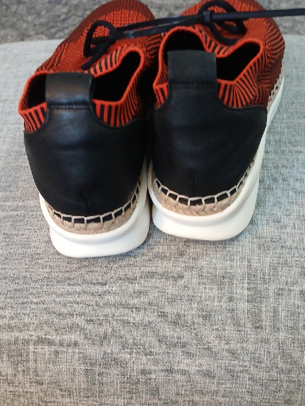 Vince Camuto Affina Knit Slip-On Sneakers in Orange and Black - Picture 4 of 5